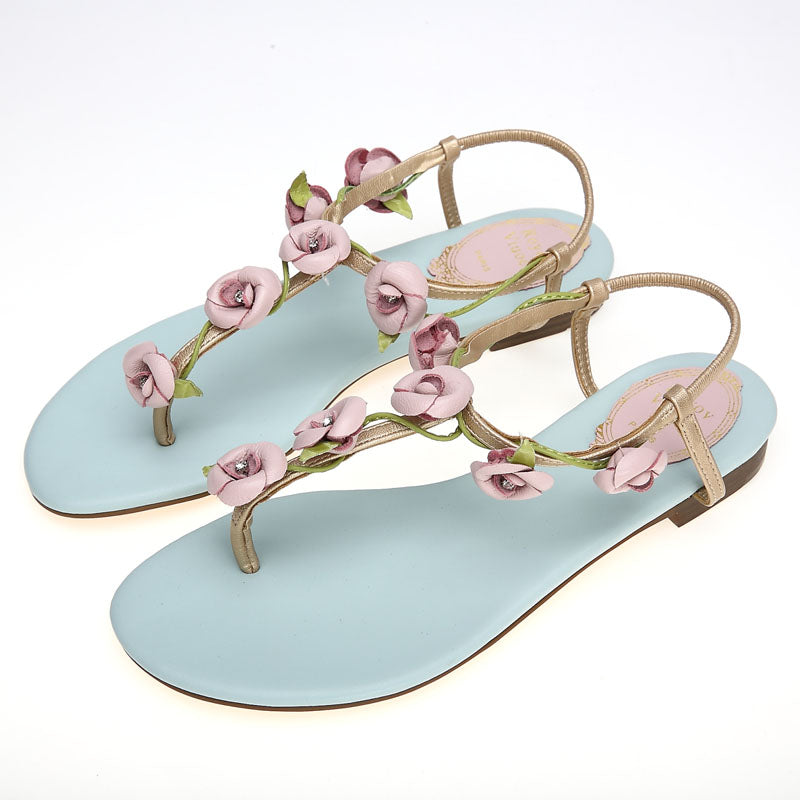 Blue sandals with delicate pink roses in genuine leather