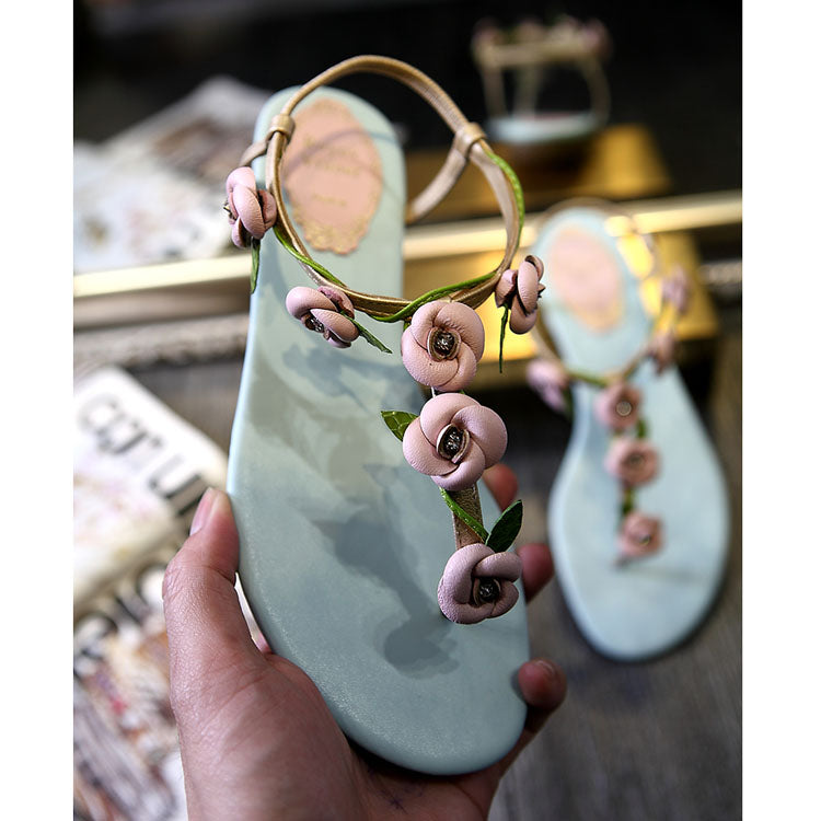 Blue sandals with delicate pink roses in genuine leather